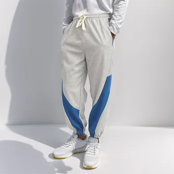 Moda masculina Solta Calça com Cores Contrastantes Bundle Pé de Calças Casuais Corredores de Calças de Longa Casual Calças de Mens Vestuário